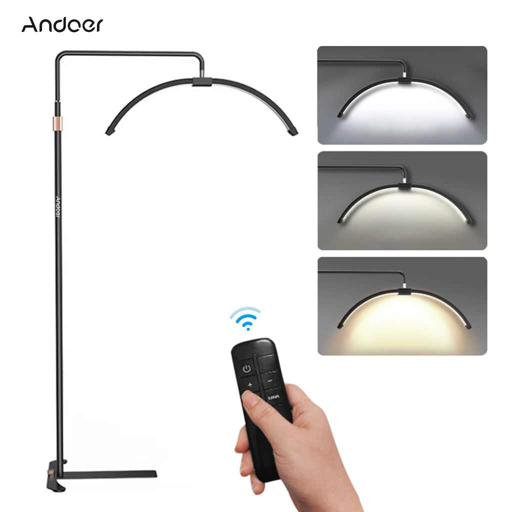 Black arched LED floor lamp for beauty tasks, featuring a remote control and adjustable color temperatures.