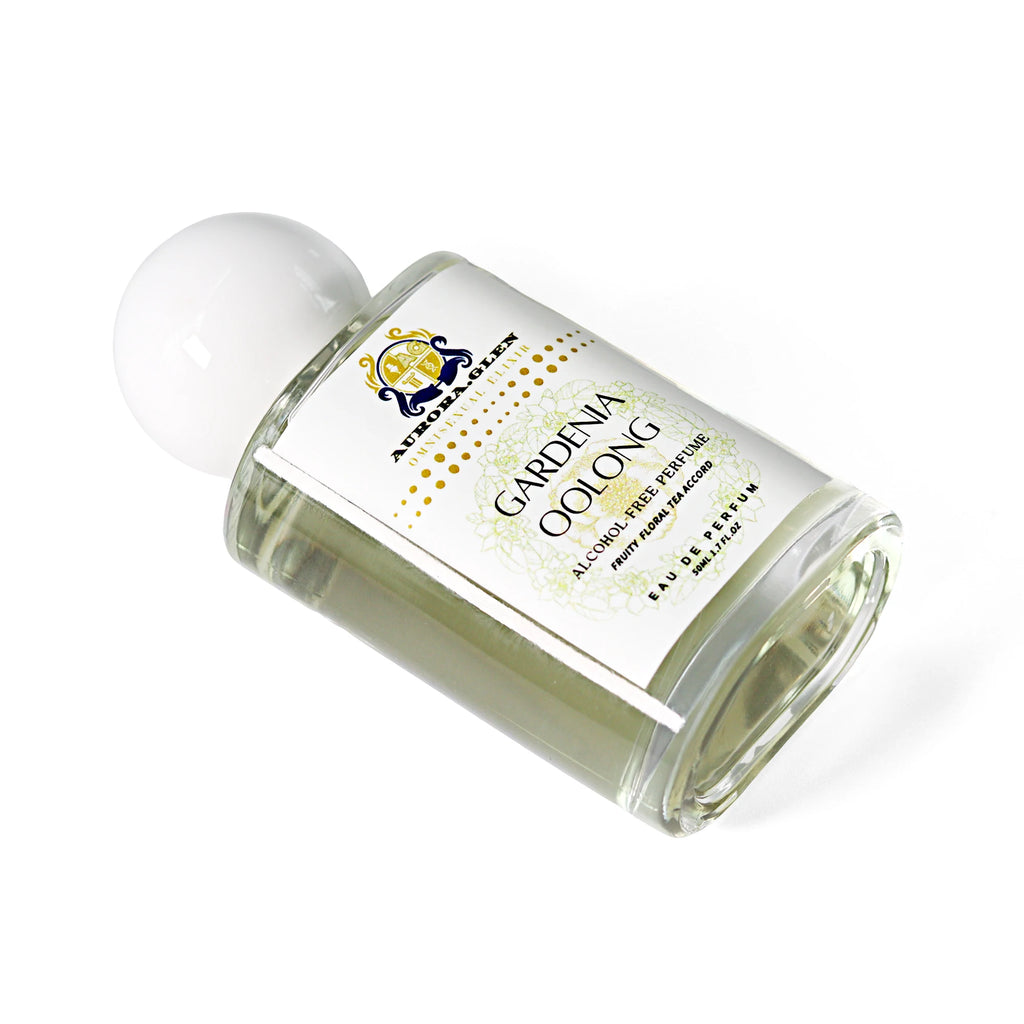 Gardenia Oolong alcohol-free perfume in a clear glass bottle with a white round cap and floral tea label.