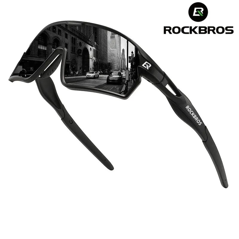 Black photochromic sports sunglasses with wraparound frame and protective lens
