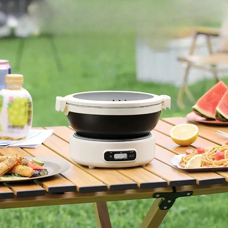 Portable electric folding hot pot with black inner bowl and white base, front control panel