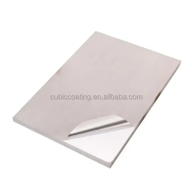 Matte silver printable sticker vinyl sheets stack, smooth surface and layered edges.