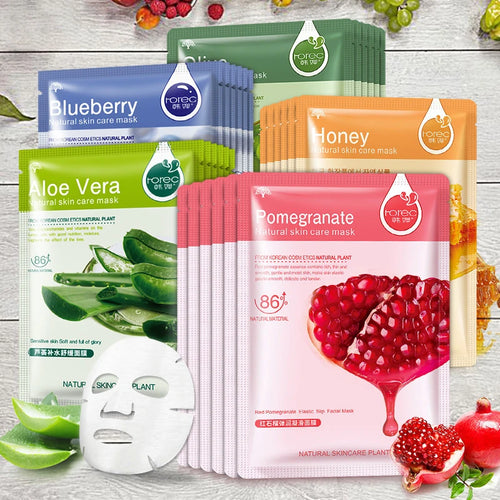 Assorted fruit sheet face mask pouches with blueberry, aloe vera, honey, and pomegranate packets