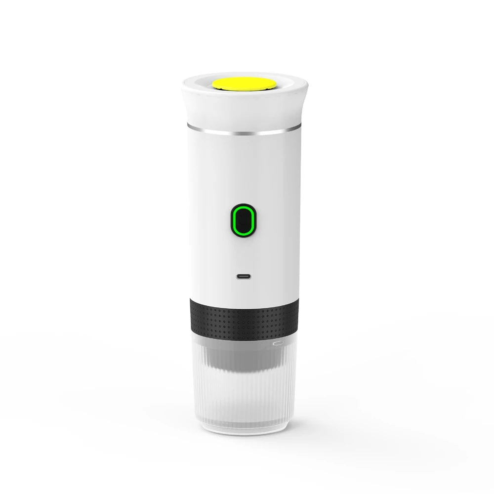 White portable electric coffee maker with yellow top button, green power light, and transparent base on white background.