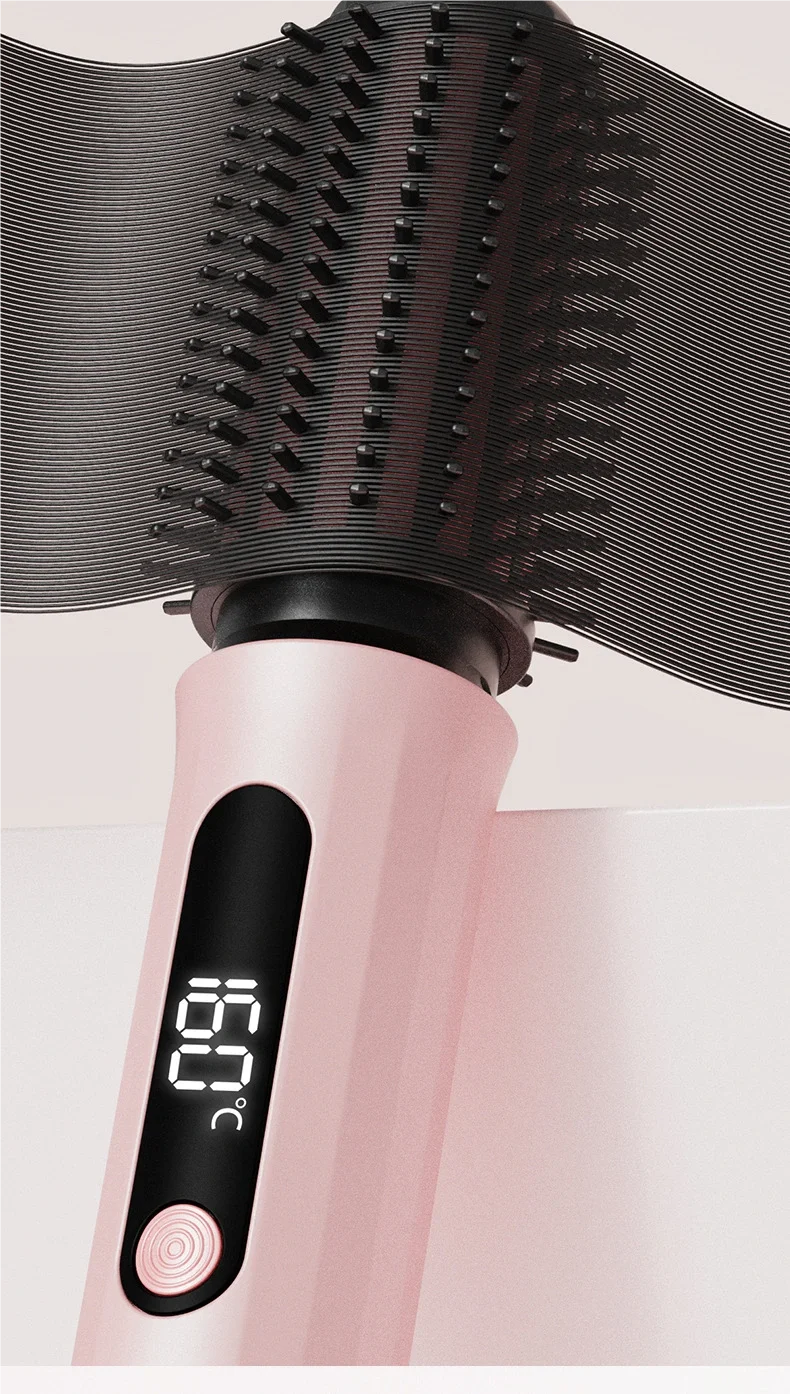 TINSOL pink negative ion hot air brush with digital temperature display and black detangling bristles for styling.