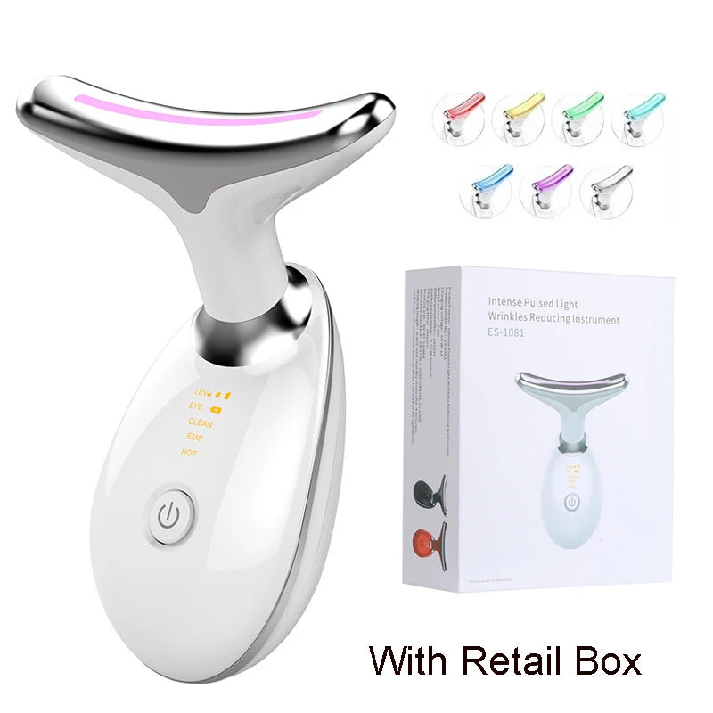 White, T-shaped facial and neck massager with silver head, LED light, and control buttons, shown with its retail box.