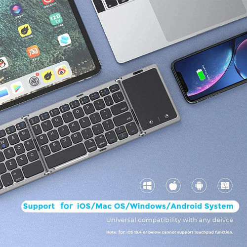 Grey foldable wireless keyboard with an integrated touchpad, compatible with iOS, Android, and Windows devices.