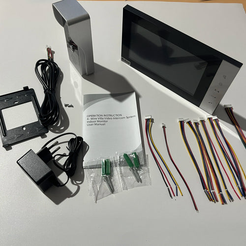 Video door intercom components kit with indoor monitor, power supply, wiring lines, and screws