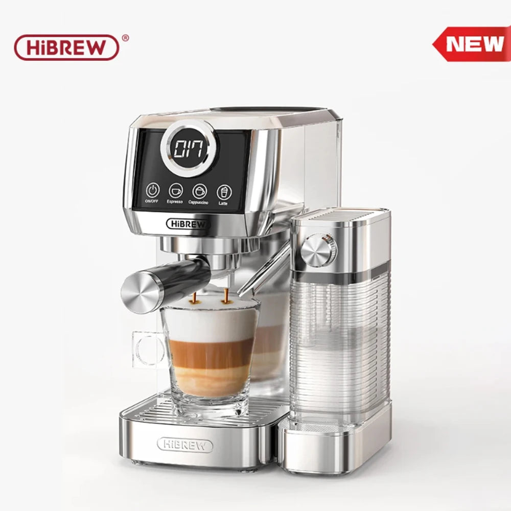 HiBREW stainless steel espresso machine with digital display, milk frother, and glass cup on a drip tray.