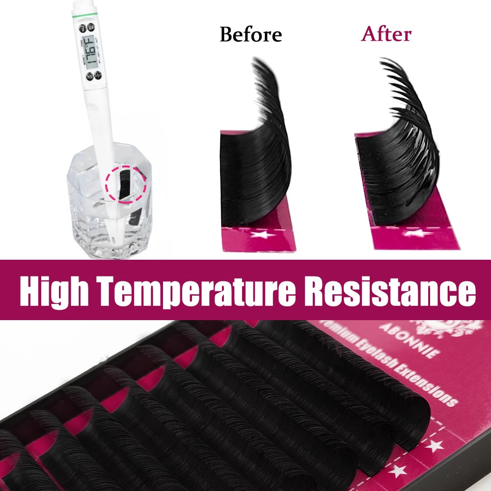 Black eyelash extensions in a tray, showing heat resistance by maintaining curl after immersion in hot water.