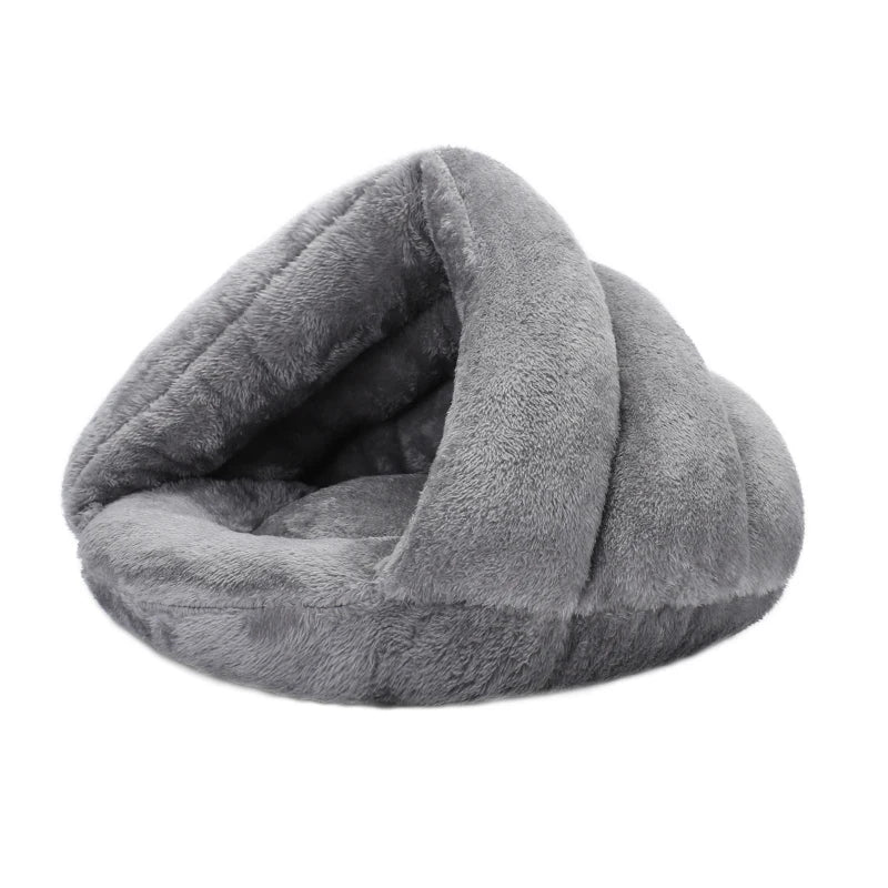 Grey plush hooded dog bed for small dogs and cats, a cozy, washable cave-style nest for warm pet comfort.
