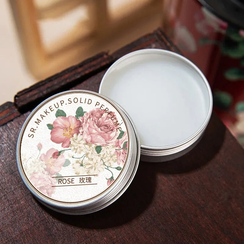 Tidesmit portable solid perfume balm for women featuring fresh long-lasting floral body aroma in elegant tin case.