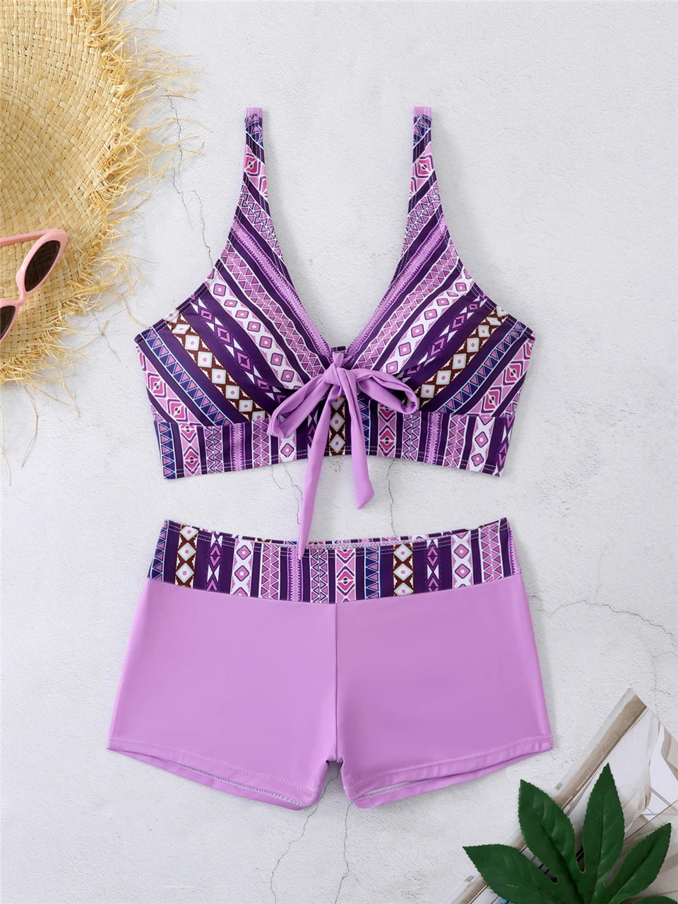 Tidesmit purple tribal print bikini set with a front-tie bralette and high-waisted solid lavender boyshort bottoms.