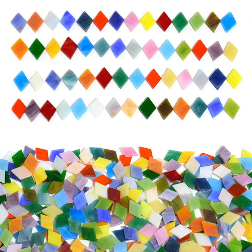 Diamond-shaped colored glass mosaic tile fragments in mixed bright blues, greens, reds, yellows