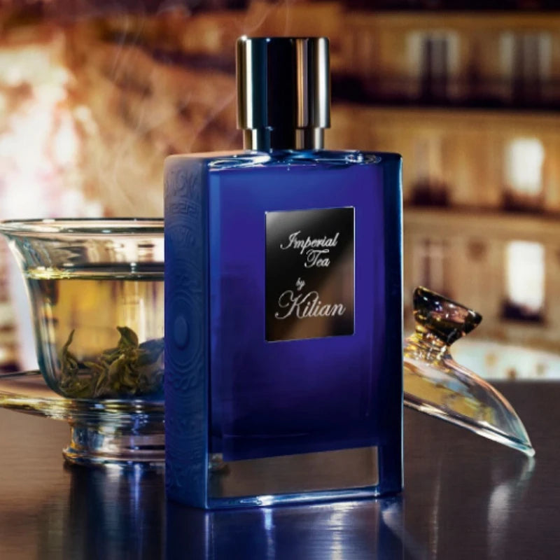 Kilian Imperial Tea unisex EDP 50ml. Blue rectangular glass bottle. Long-lasting niche floral woody tea fragrance.