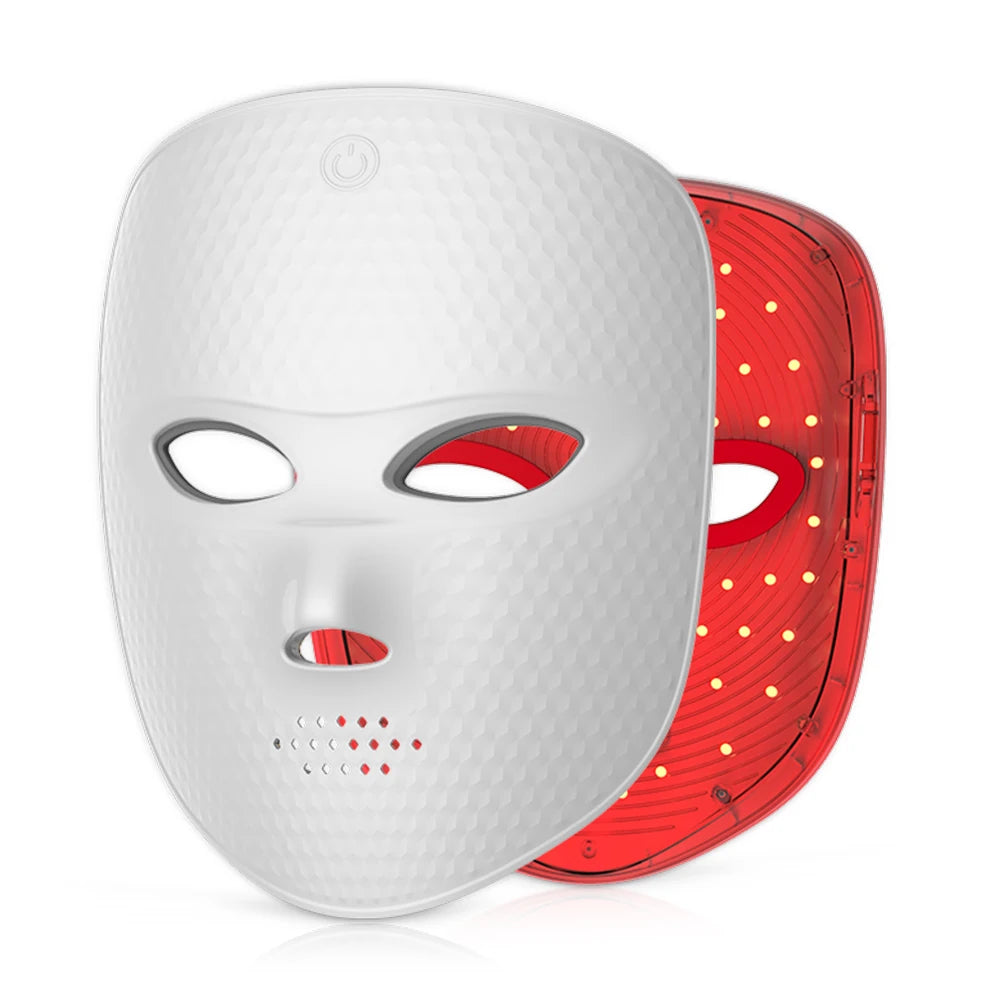 White wireless LED facial mask with a textured surface, showing the red light interior.