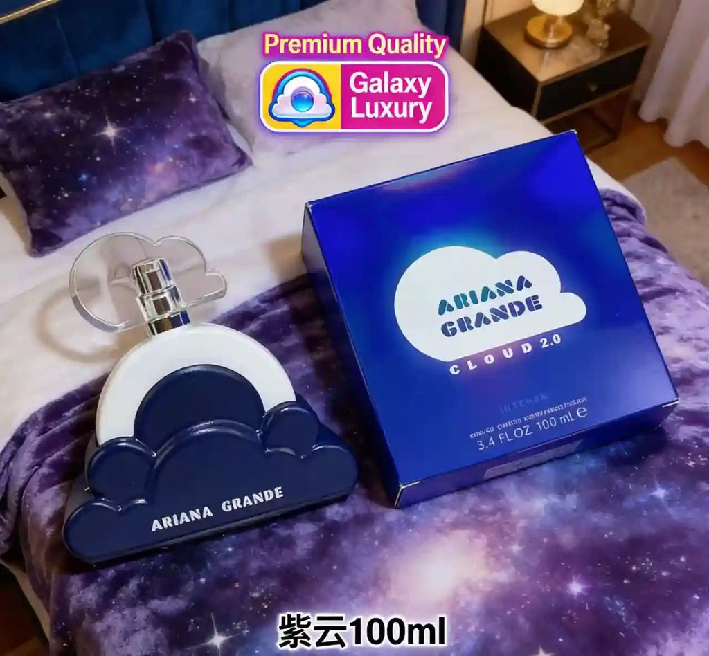 Ariana Grande Cloud 2.0 Intense EDP 100ml. Iconic blue cloud-shaped perfume bottle for women on galaxy print bedding.
