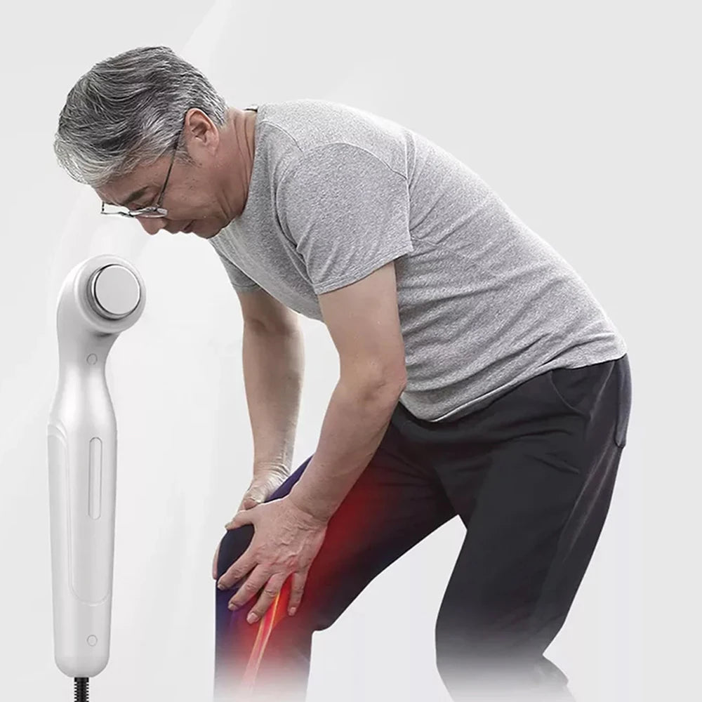 White handheld ultrasound physiotherapy device for knee pain relief and muscle stimulation therapy.
