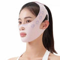 Woman wearing a light pink V-line lifting face bandage mask for double chin reduction and facial slimming support.