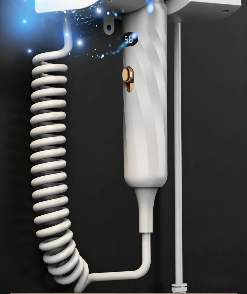 White wall-mounted 1800W hair dryer with LED temp display, gold button, and coiled cord for hotel or home bathroom.
