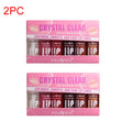 6-piece set of hydrating, transparent lip oil and moisturizing lip glaze in pink display boxes for lustrous lips.