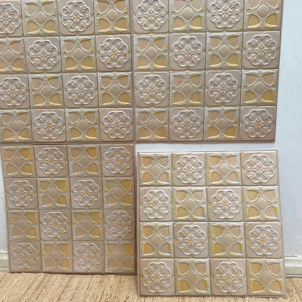 Peel-and-stick decorative square tile backsplash, cream floral embossed pattern