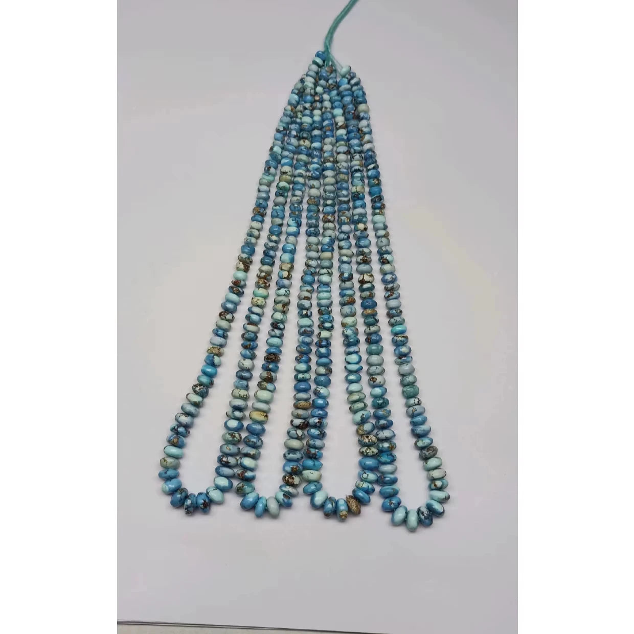 Turquoise rondelle bead strand, smooth small beads on loose filament looped