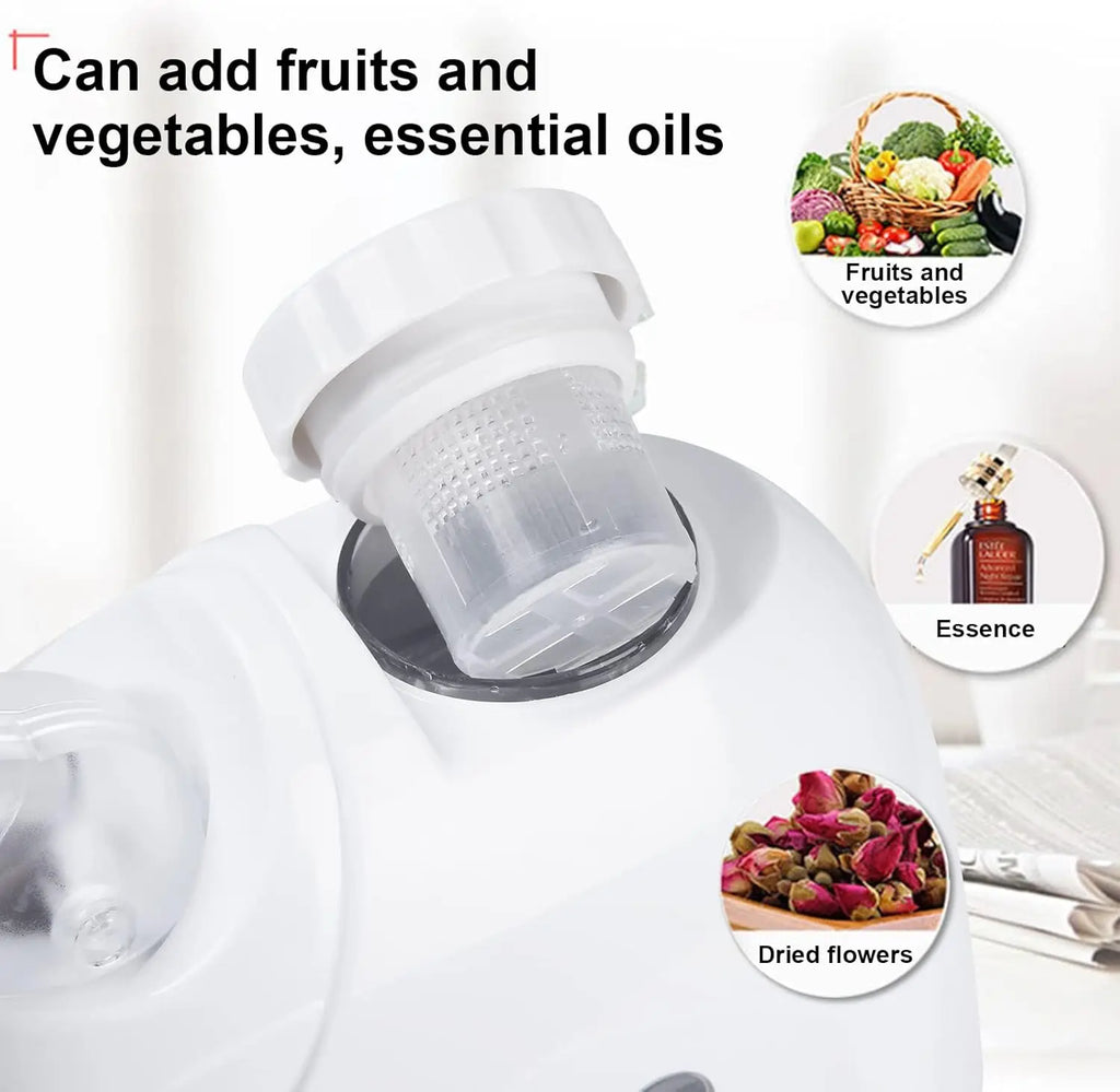 White facial steamer with fruit and essential oil infuser basket for deep skin hydration and pore cleansing at home.