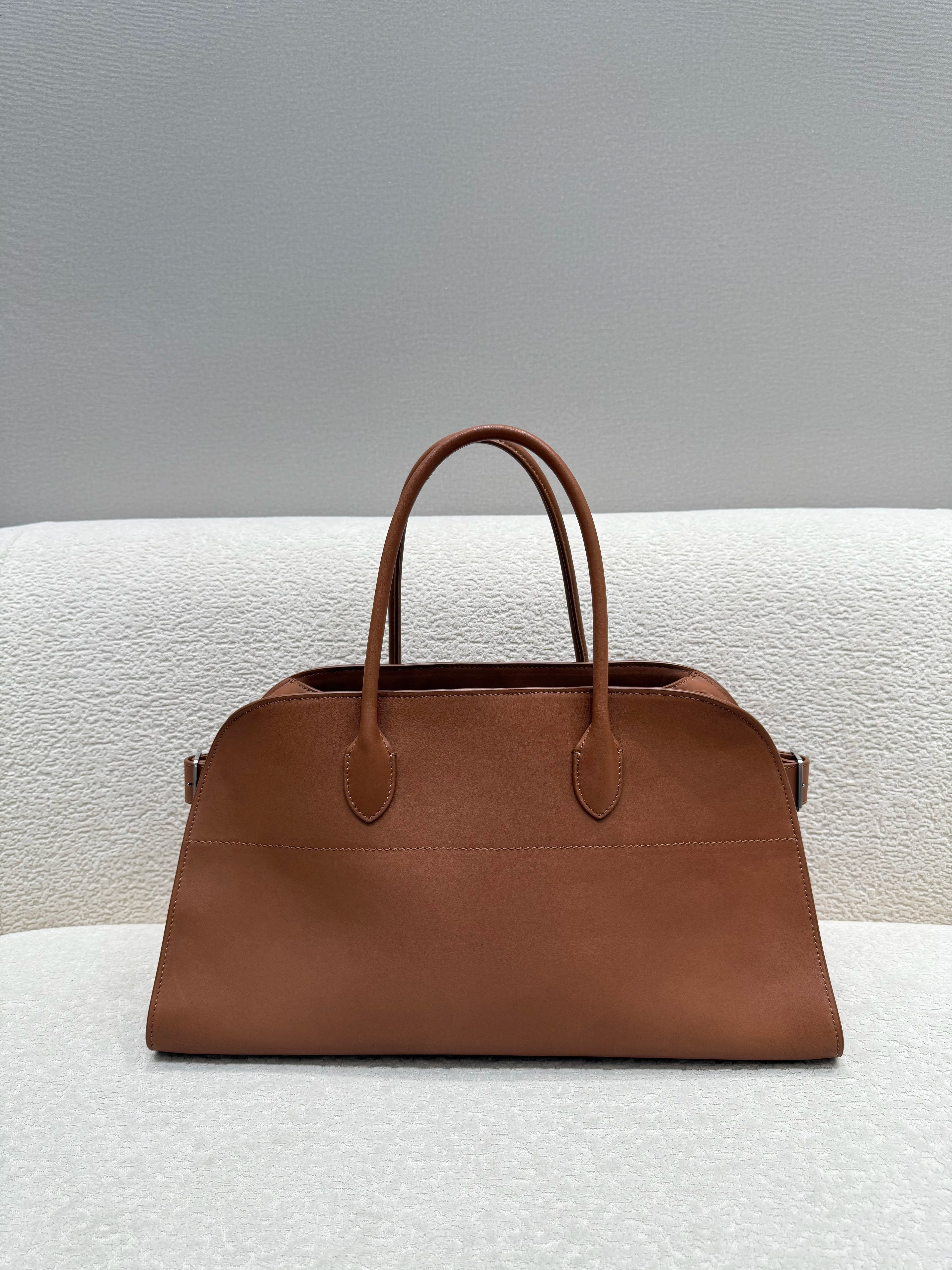 Unisex saddle leather all steel hardware inner sheepskin single shoulder large capacity hand-held horizontal bag