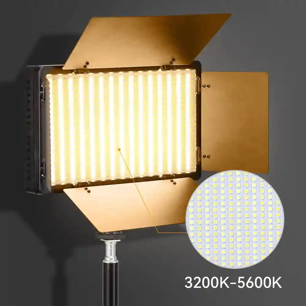 Rectangular LED video light with gold-colored barn doors on a stand, featuring adjustable color temperature 3200K-5600K.