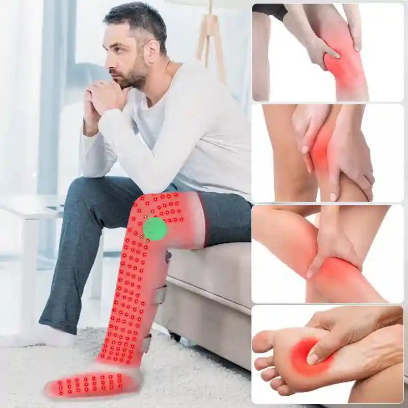 Man wearing a grey, wrap-around leg heating brace with red light therapy dots and a circular control panel.