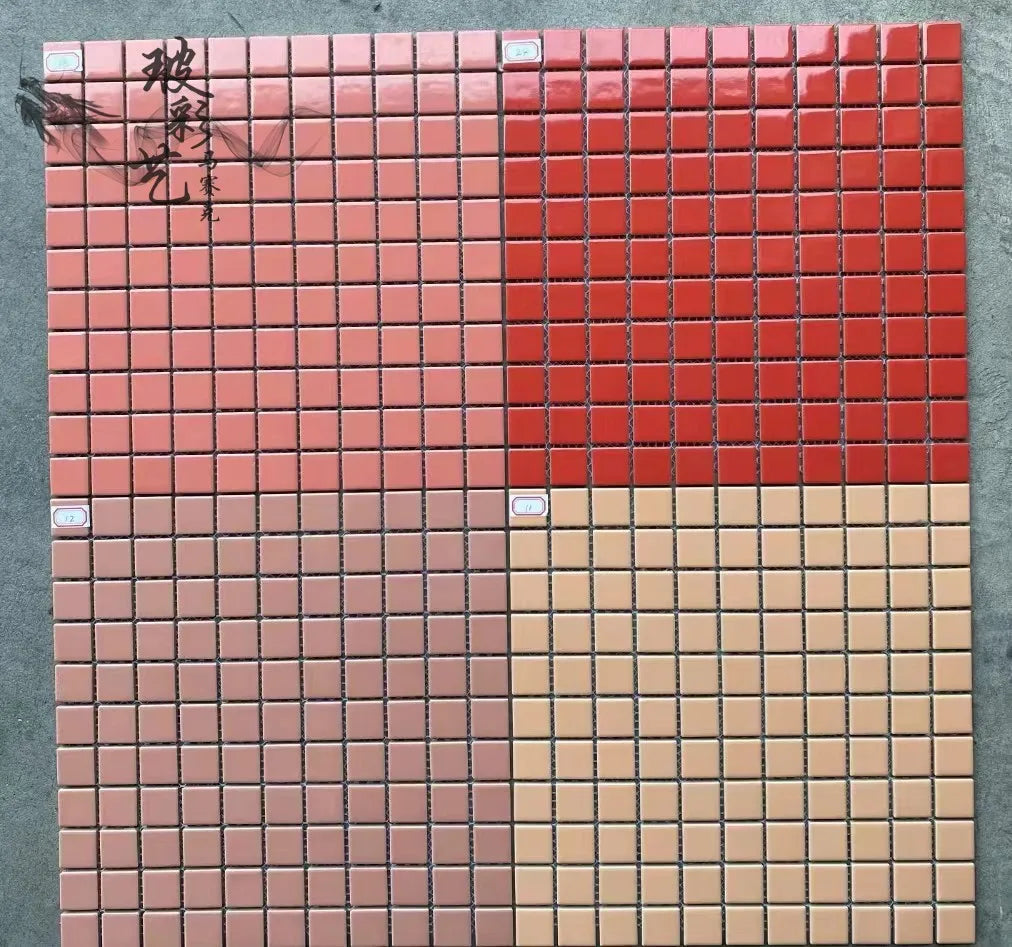 Ceramic mosaic tile sheet with pink upper tiles and cream lower tiles on grid