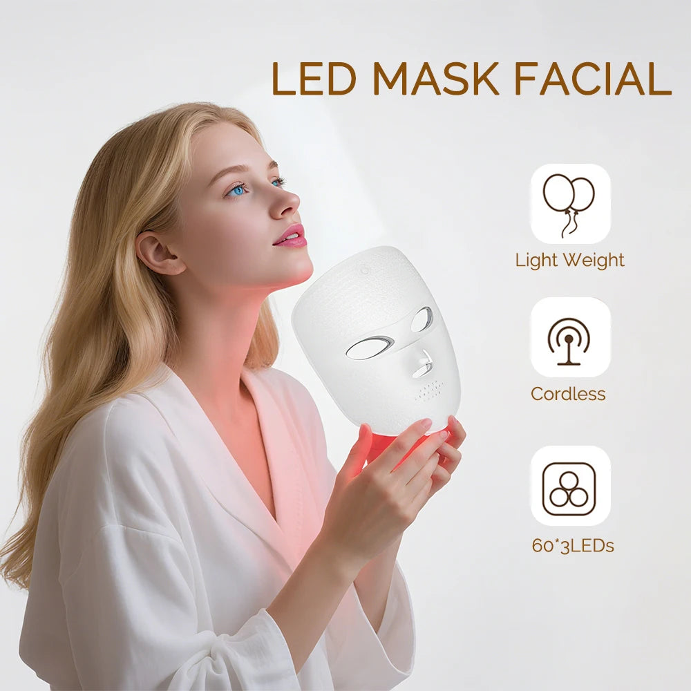 Woman holding a white, lightweight, cordless LED facial mask with 60*3 LED lights against a white background.