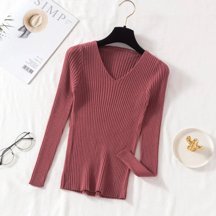 Tidesmit dark rose ribbed knit sweater with long sleeves and a V-neck, displayed on a hanger.