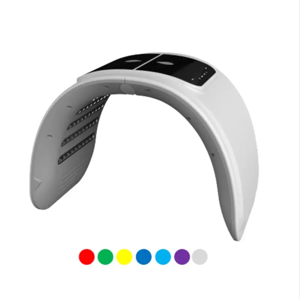 White arched LED light therapy face mask with black control panel and seven color indicator dots below.