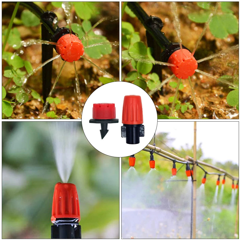 Adjustable drip emitters watering plants with steady mist from red nozzle caps