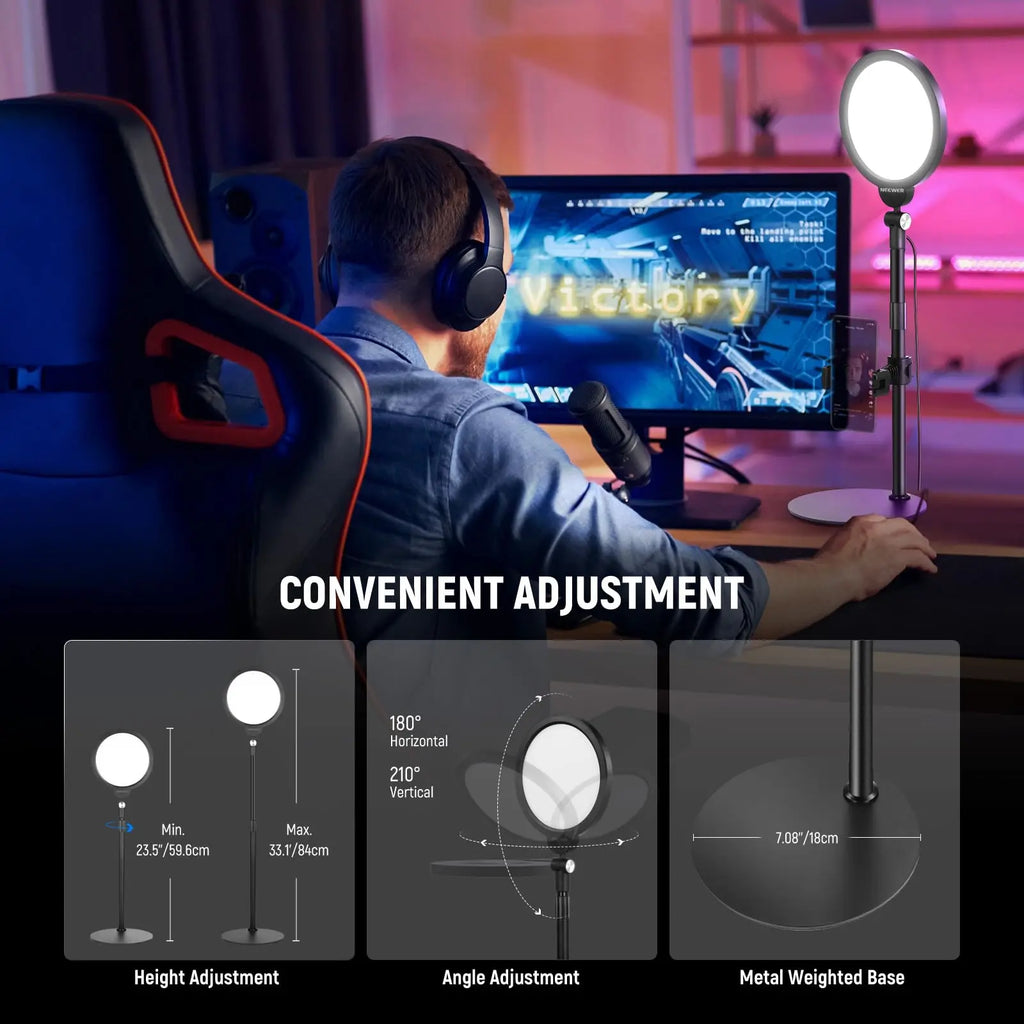 Black circular LED ring light on an adjustable metal stand with a weighted base, used for desktop streaming lighting.