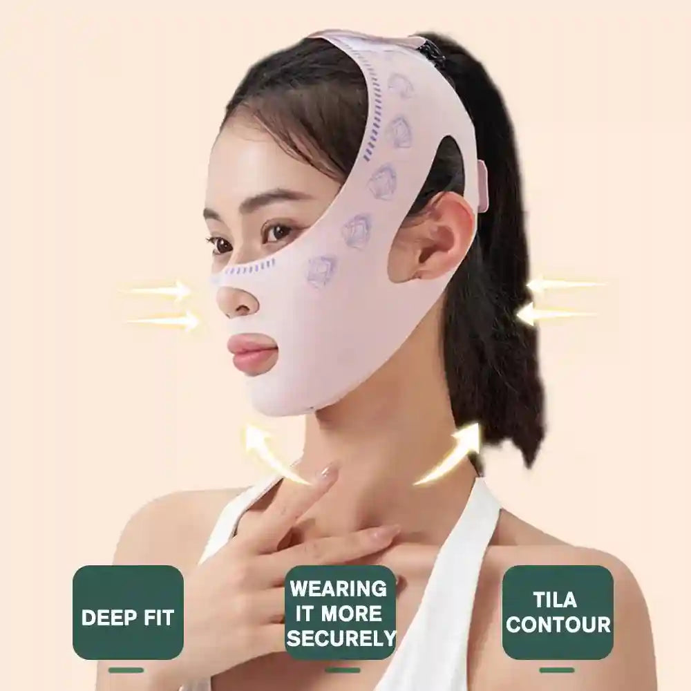 A woman wears a light pink, fabric V-line lifting mask with a patterned design, designed to contour the chin and cheeks.