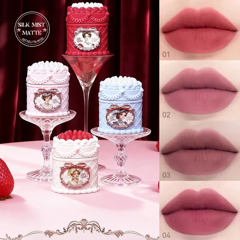 Vintage strawberry cake-shaped matte lip mud with a soft-focus velvet finish and diverse highly pigmented lip swatches.