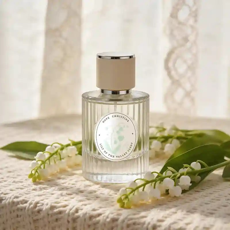 HOPE CHRISTINE Lily of the Valley EDT: A floral fragrance for women in a ribbed glass bottle with a neutral cap.