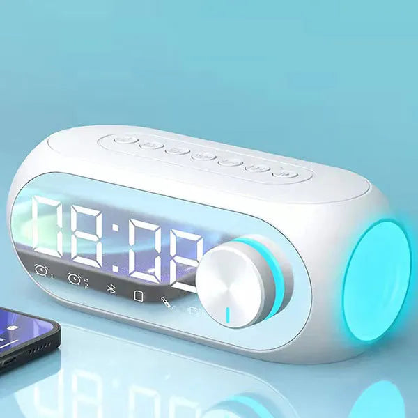 White Bluetooth alarm clock radio speaker with glowing accent light and time display