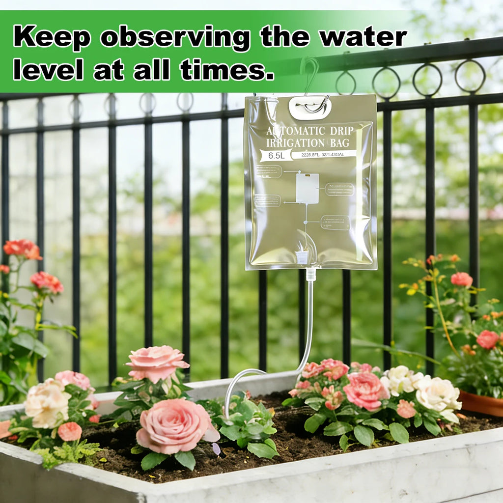 Hanging automatic drip irrigation watering bag over flower bed with white irrigation tubing