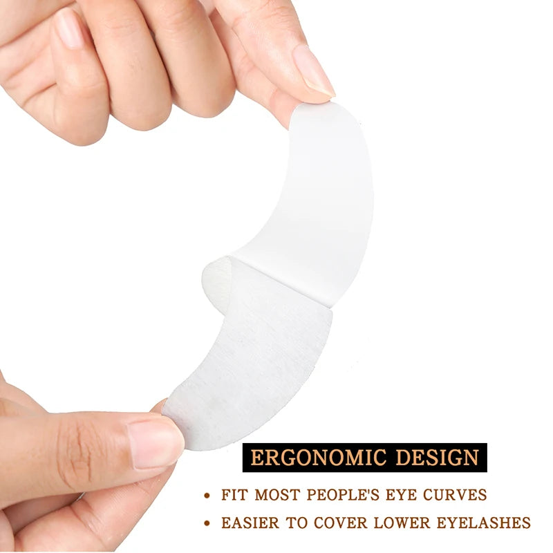 White, lint-free under-eye gel patches for eyelash extensions with ergonomic curved design for secure fit.