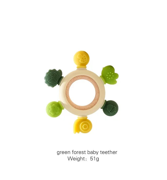Green forest baby teething ring in silicone and wood, perfect for infant teething relief.