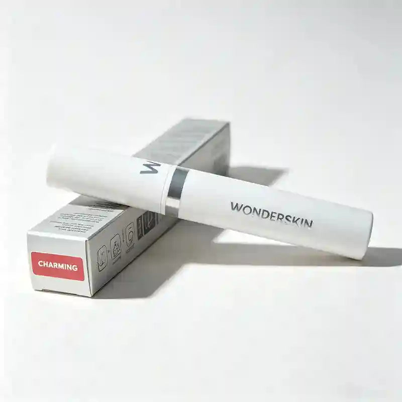 Wonderskin peel-off tattoo lip stain in Charming shade, white tube with silver packaging, waterproof matte lip gloss.