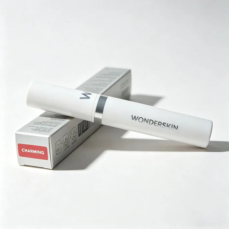 Wonderskin peel-off tattoo lip gloss in Charming shade with white tube and box packaging for long-lasting matte lip tint.