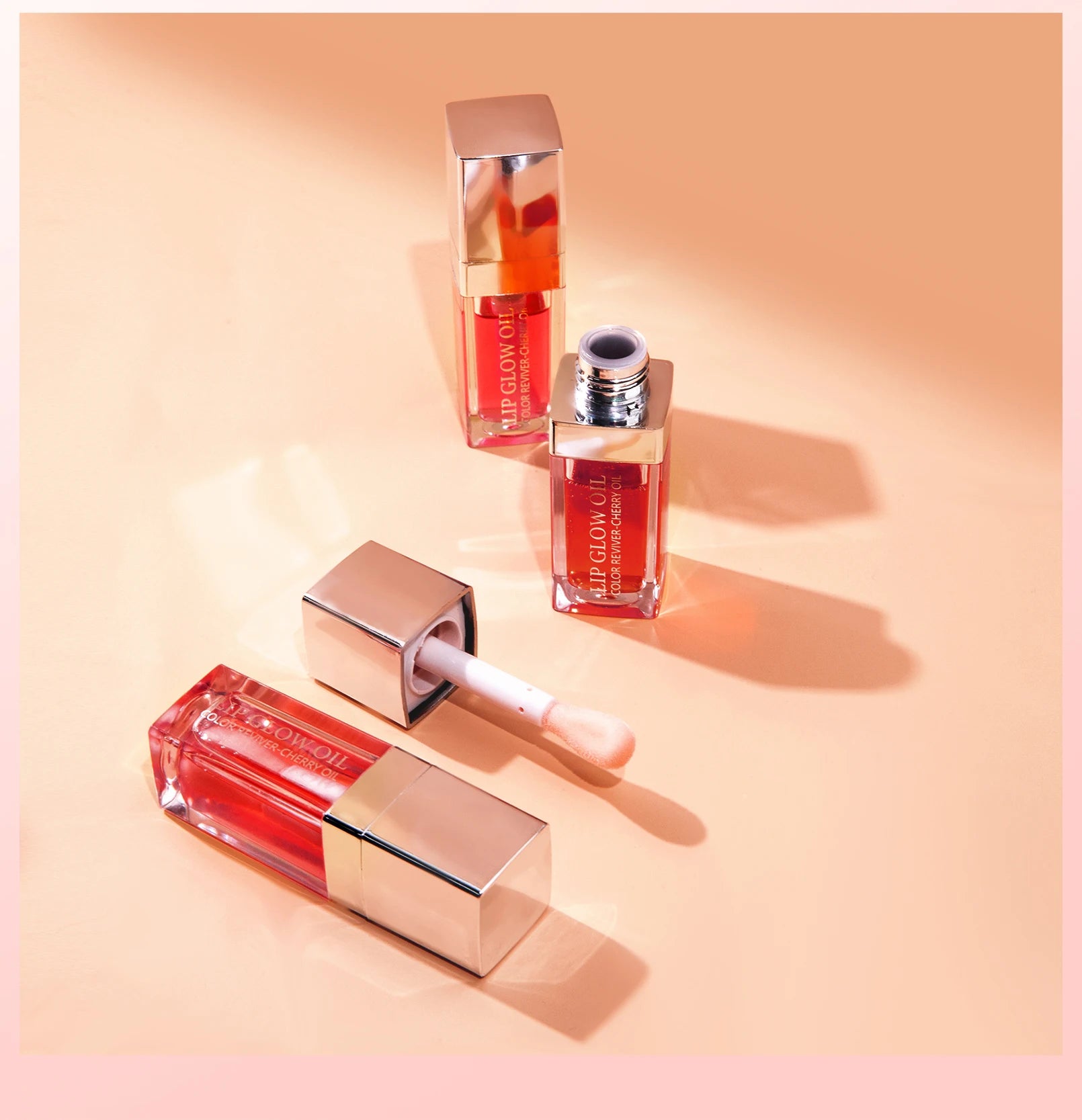 Crystal jelly moisturizing lip oil with applicator, red tinted plumping lip gloss for a sexy, high-shine glow finish.