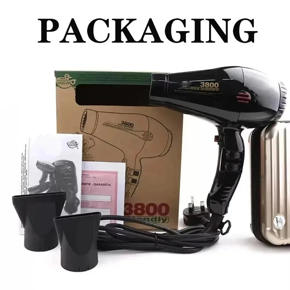 Black 2100W hair dryer with 2 nozzle attachments, power cord, warranty card, and storage case in eco-friendly packaging.