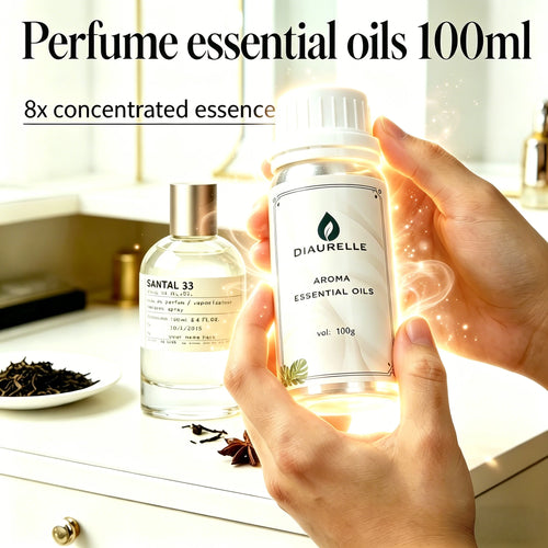 Diaurelle concentrated essential oil in a white bottle for wellness aromatherapy, next to Santal 33 perfume.