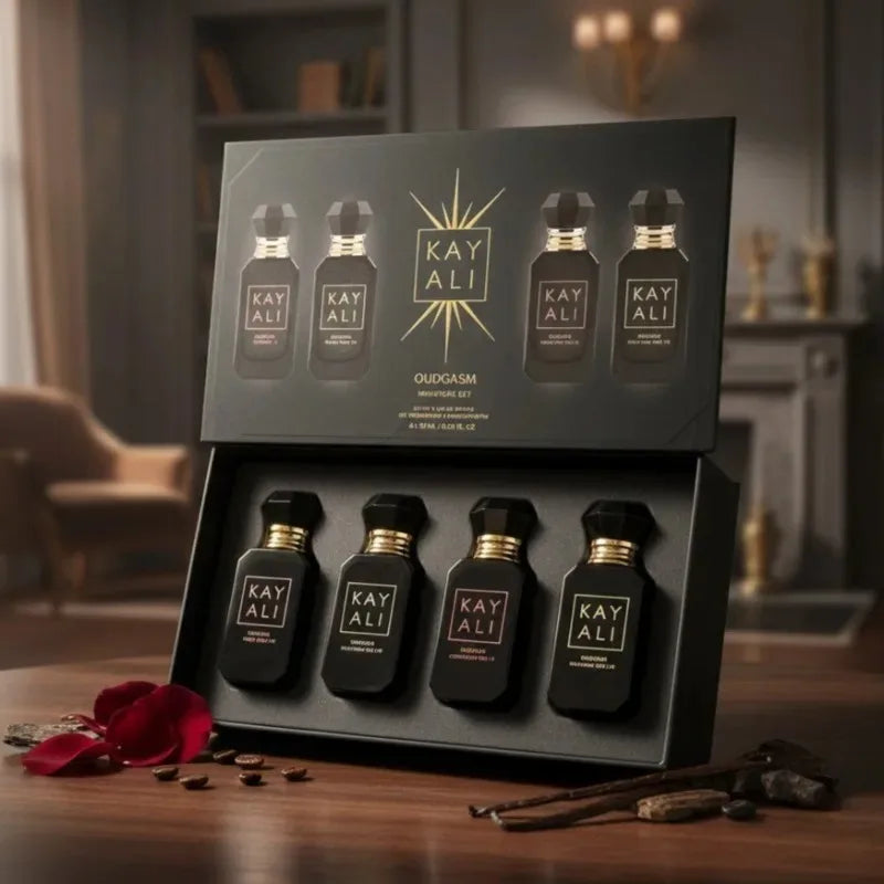 KAYALI Oudgasm gift set: 4 floral, musky EDP minis in elegant black glass bottles for women. Luxury natural fragrance.