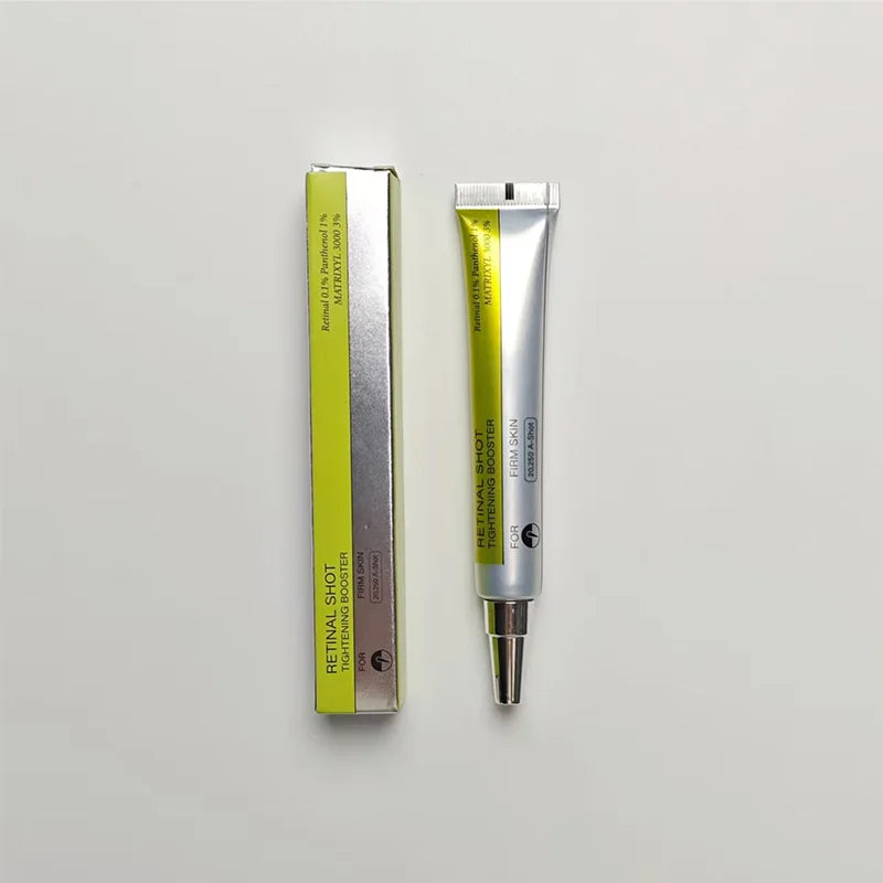 Retinol shot tightening eye cream tube with matching outer box, green accent